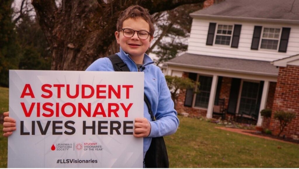 Matthew proudly announcing his candidacy for Student Visionaries of the Year outside his home in Malvern, Pennsylvania. Photos courtesy of The Leukemia & Lymphoma Society and Matthew Hauser.